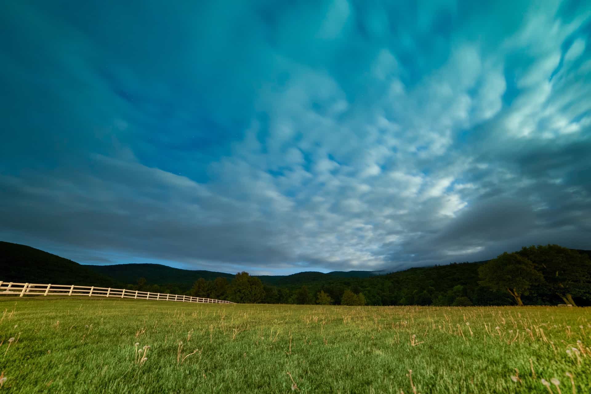 mountains-night-clouds-grass